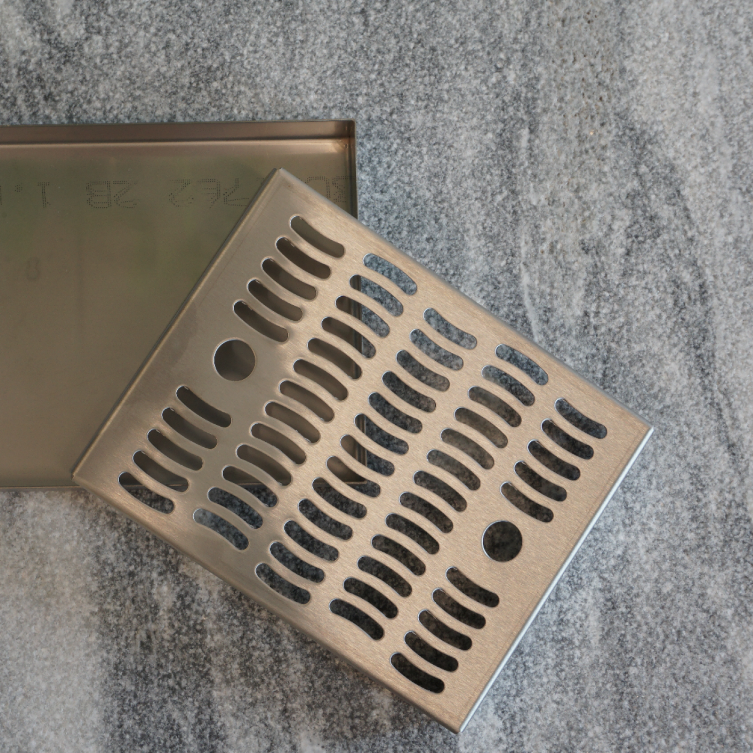 Drypbakke til taphane